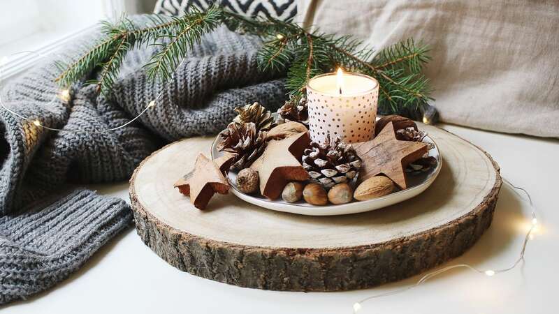 Best candles for making the house smell like Christmas (Image: Getty)