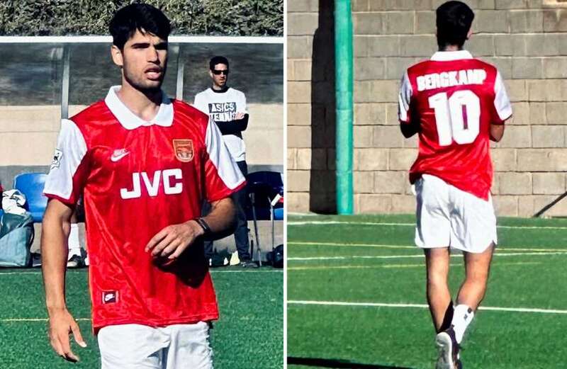 Tennis icon nets a winner with his nostalgic choice of kit as he plays in football game