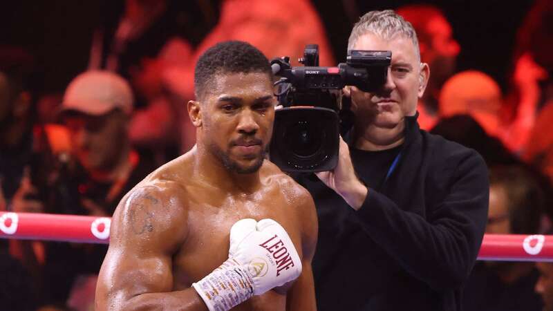 Anthony Joshua celebrates beating Otto Wallin (Image: AFP via Getty Images)