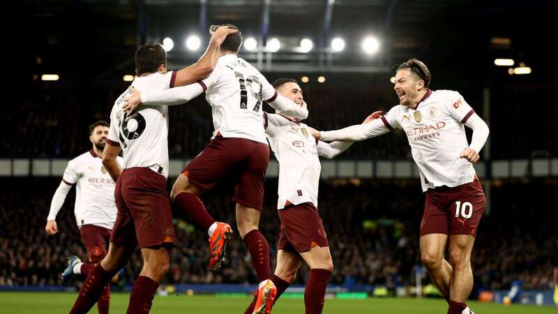 Man City players celebrate after going in front against Everton (Image: Naomi Baker/Getty Images)