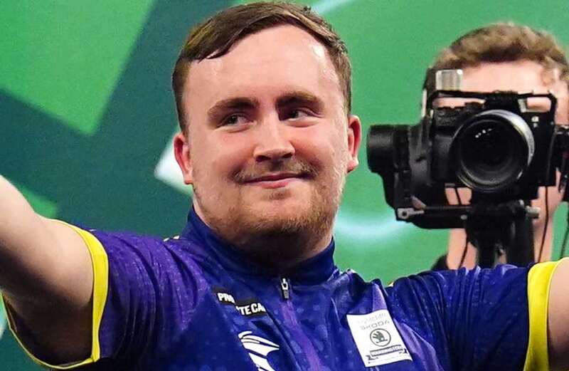 Teenager beat his childhood hero to reach the quarters of the World Darts Championship