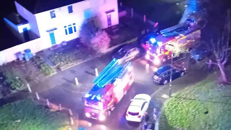 Locals neighbouring the residential tower block also came out to see what was happening as emergency services filled the cul-de-sac with flashing blue lights