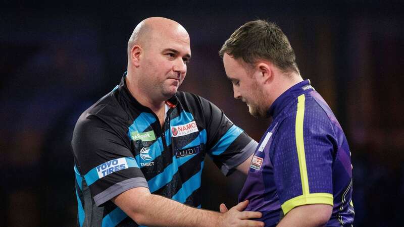 Rob Cross congratulates Luke Littler (Image: TOLGA AKMEN/EPA-EFE/REX/Shutterstock)