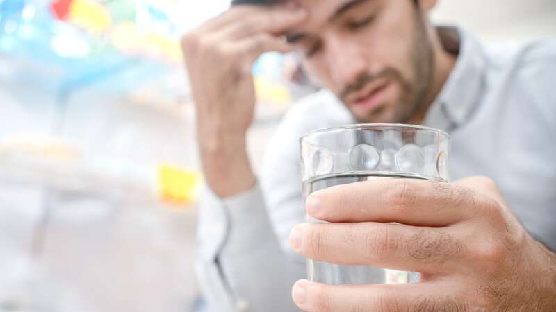 After the initial period of drunkenness and dehydration wears off, most of the booze will be out of your system after about 24 hours (Image: Getty Images)