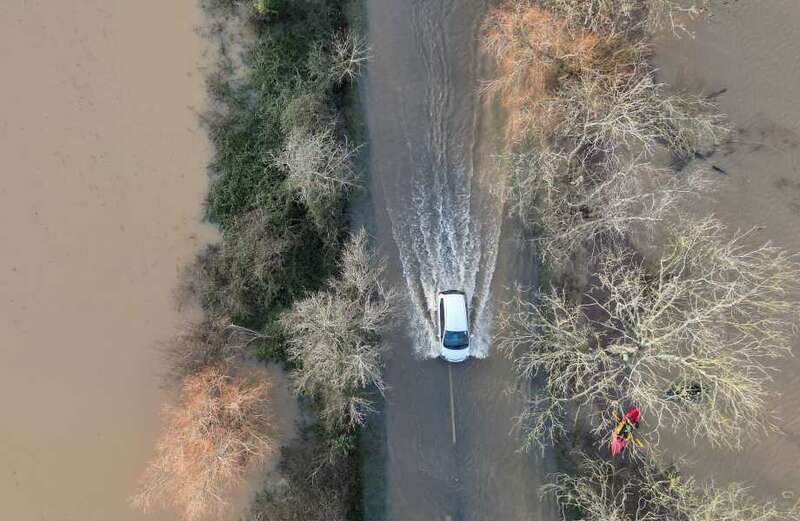 Forecasters say the freezing temperatures will hang around all week - while almost 200 flood warnings remain in place