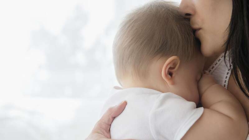 You could learn a lot about your baby by kissing its forehead (Image: Getty Images/Tetra images RF)