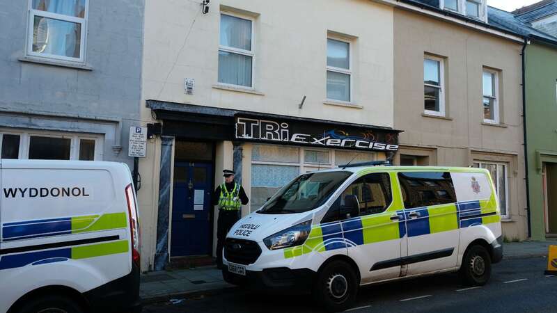 Police outside a home in Pembrokeshire, Wales (Image: Martin Cavaney/Athena Pictures)