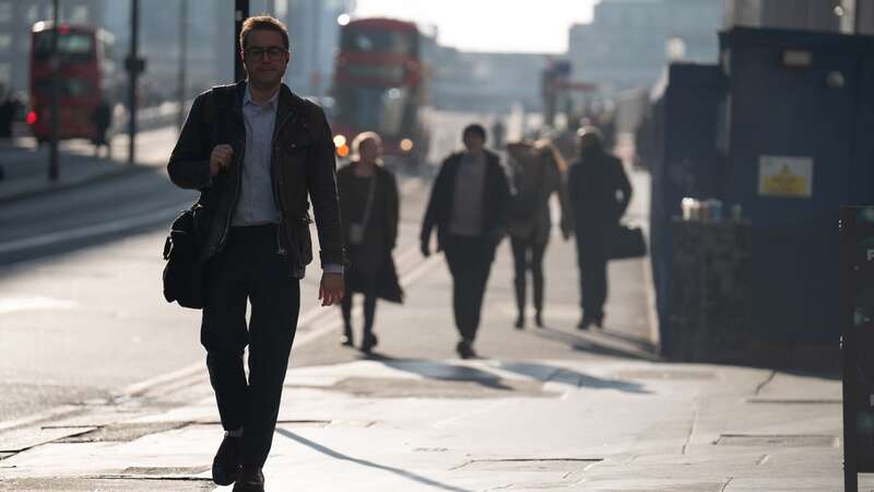 Workers on the morning commute in Spitalfields, London (Image: PA Archive/PA Images)