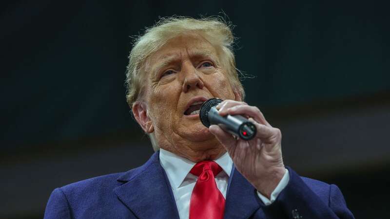 Former president Donald Trump speaks to voters during a visit to Iowa (Image: Getty Images)