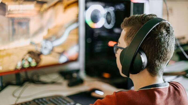 Gamers who are listening to high-intensity sound levels and for long periods of time may be at risk of permanent hearing loss (Image: Getty Images)