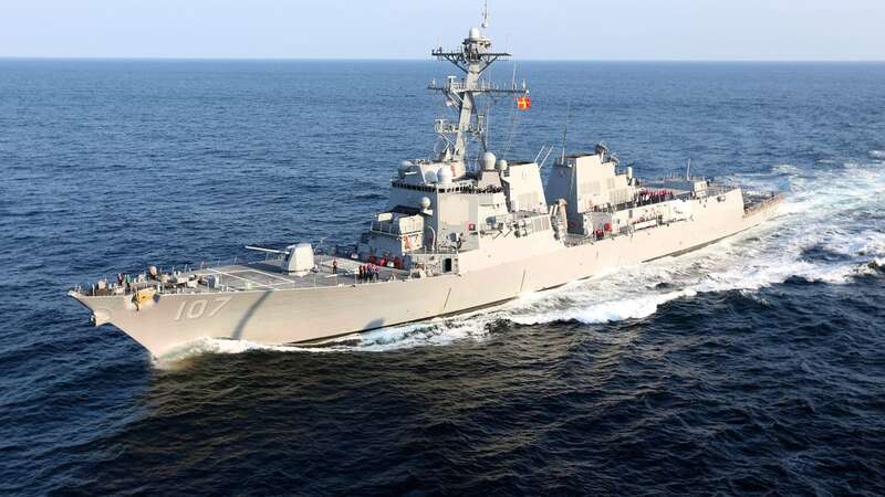 A US Navy ship responded after Houthi terrorists fired missiles at a container ship (Image: Getty Images)