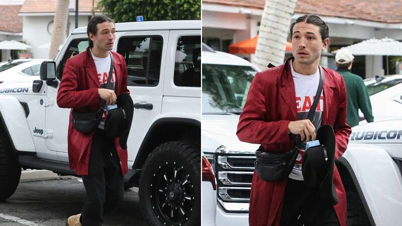 Ezra Miller was seen in a red jacket