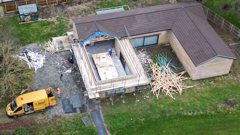 One part of the building has been stripped back (Image: PA)