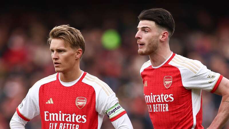 Martin Odegaard celebrated with the Arsenal photographer following the win over Liverpool (Image: Michael Zemanek/REX/Shutterstock)