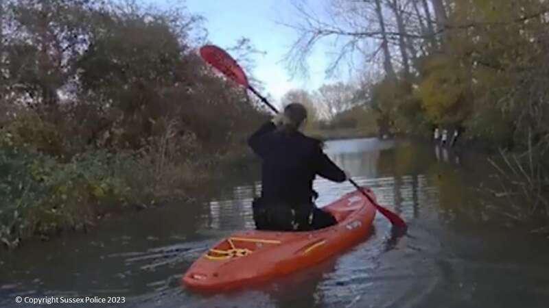 Watch as cops commandeer kayaks to arrest drunk driver who plunged into river