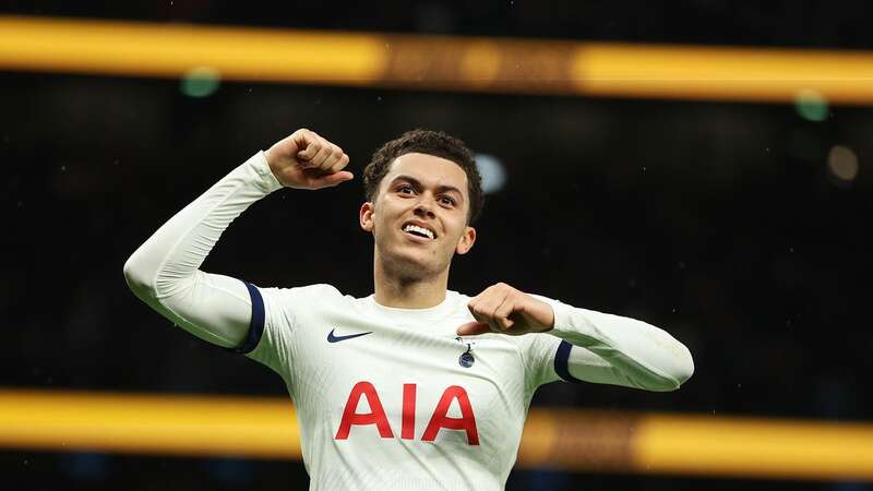 Brennan Johnson celebrates scoring a 96th-minute winner for Tottenham against Brighton