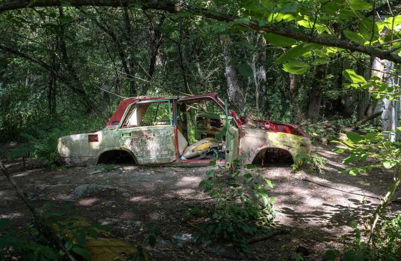 Read on to see pictures of the rotting vehicles