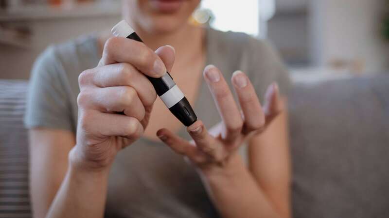 A woman checking her blood sugar levels [file image] (Image: Getty Images)