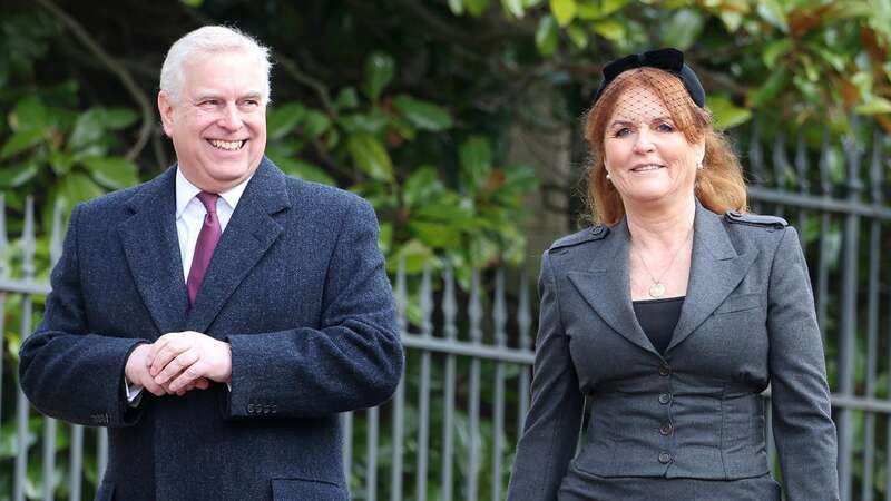 Prince Andrew smiles as he leads the Royal family to a service for King Constantine of the Hellenes (Image: Getty Images)