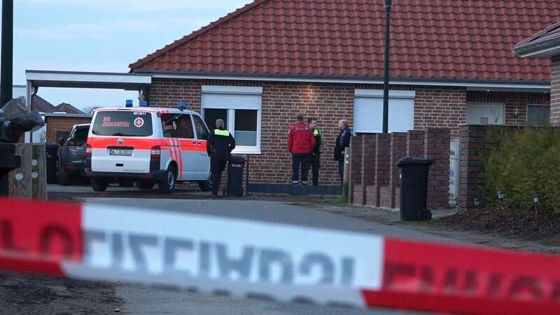 Emergency services stand behind a cordon at the scene (Image: Kai Moorschlatt/picture-alliance/dpa/AP Images)