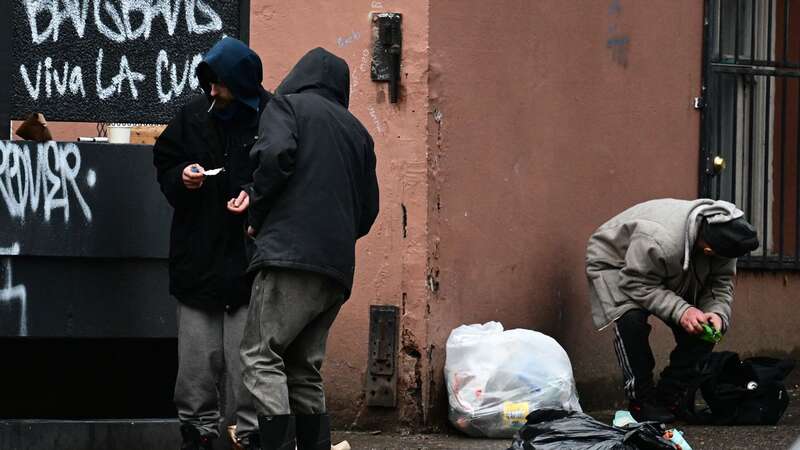 A person holds a foil while smoking following the decriminalisation of all drugs, including fentanyl and meth, in downtown Portland, Oregon in January (Image: AFP via Getty Images)