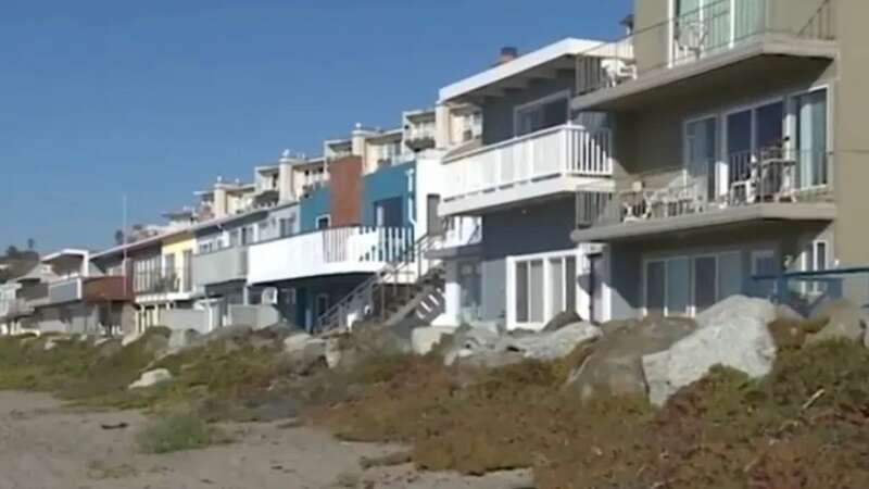 Florida homeowners are being fined £4million for erecting a barrier to block a public beach pathway (Image: KSBW 8)