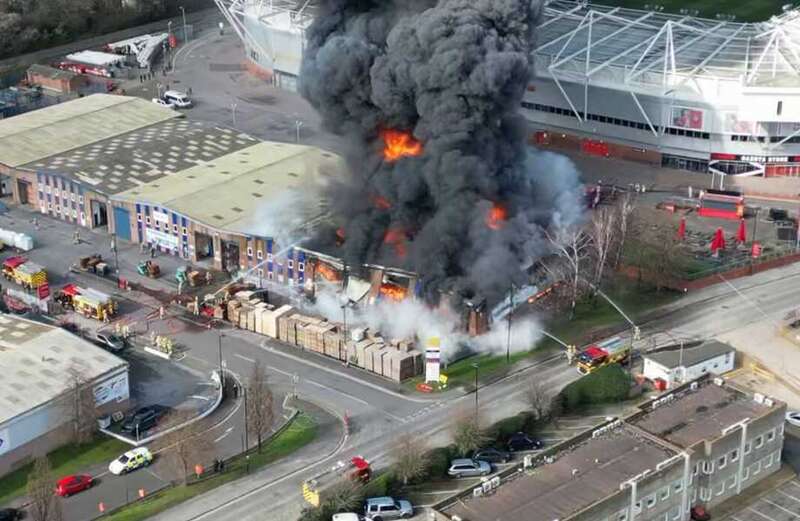 Watch dramatic firefighters battle the blaze as the ground was evacuated