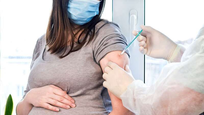 An expectant mum being vaccinated (Image: Getty Images/iStockphoto)