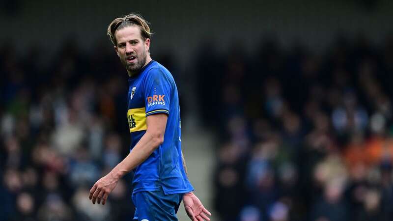 AFC Wimbledon midfielder Harry Pell has been charged with misconduct (Image: Mike Hewitt/Getty Images)