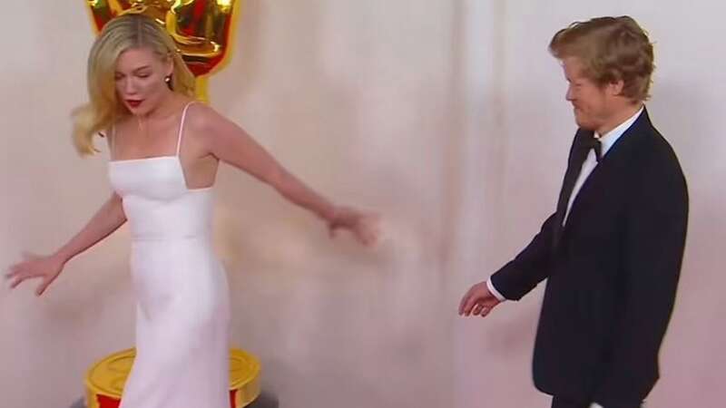 Kirsten Dunst causes chaos at the Oscars as she crashes into giant statue