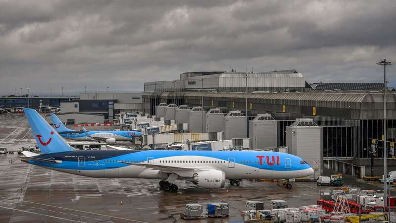 The plane had just touched down after flying from Madeira when the armed cops boarded (Image: AFP via Getty Images)