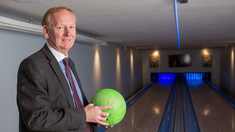 Graham Wildin inside the leisure centre he has built for himself and his family in his back garden (Image: SWNS)