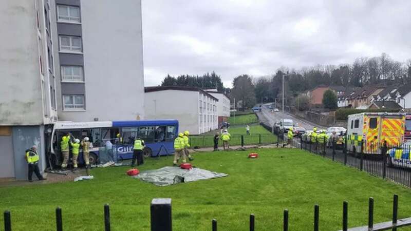 It is unknown how the bus came off the road and hit the block of flats (Image: Supplied)