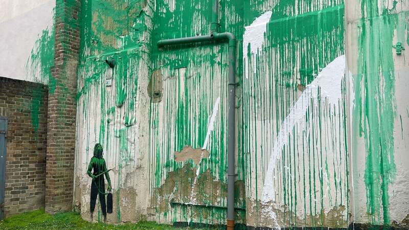 The Banksy tree mural appears to have defaced with white paint (Image: w8media)