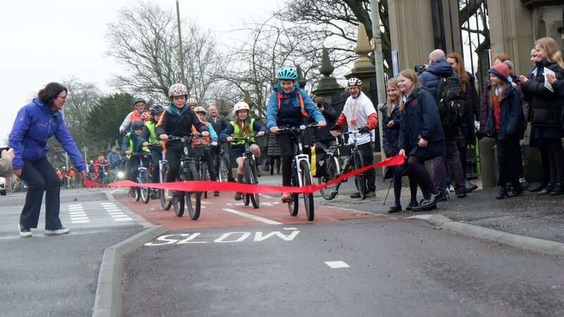 The ribbon was finally cut on the CCWEL as local schoolchildren rode along the new £23m cycle route. (Image: No credit)