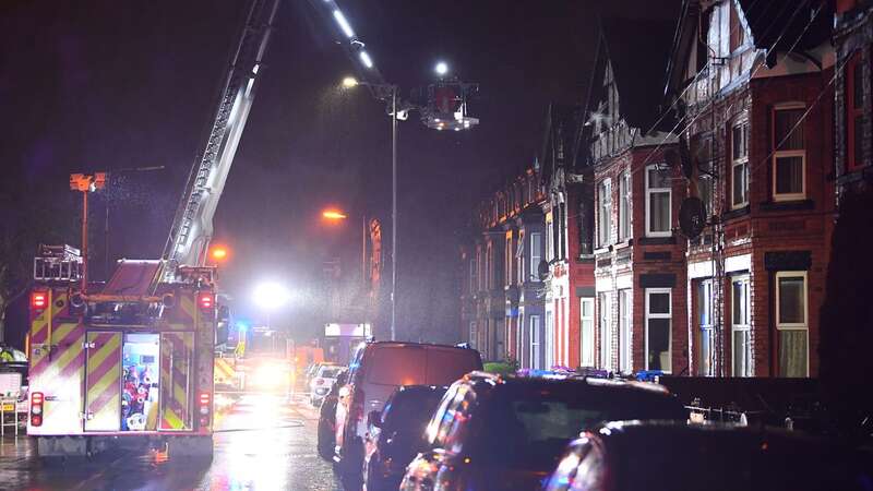 Fire Fighters damping down from a Hydraulic Platform on Rathbone Road (Image: No credit)