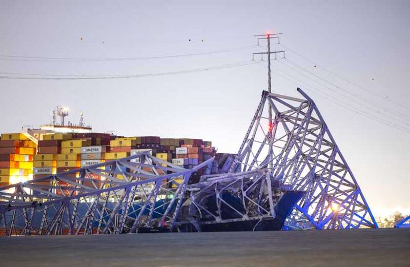 Heart-pounding video captured the moment the cargo vessel slammed into the bridge