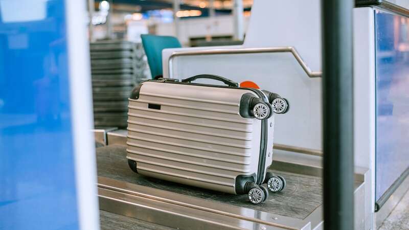 Taking a wheeled suitcase could see you fork out more (Image: Getty)