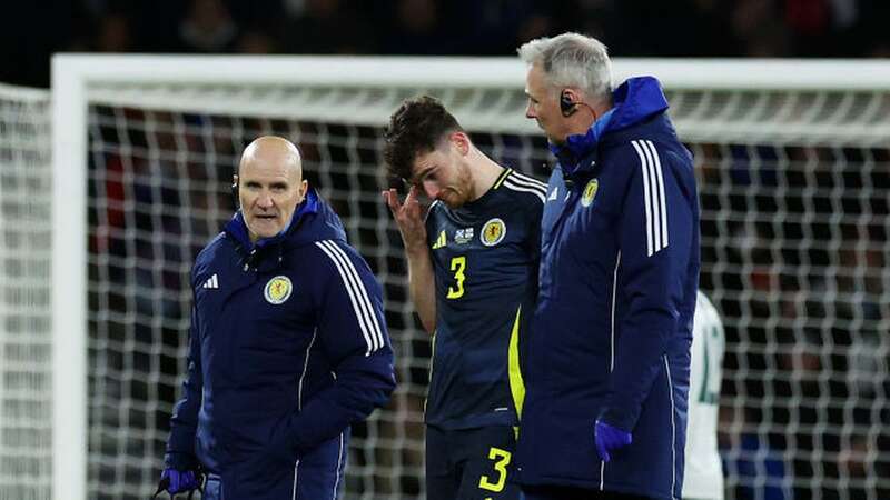 Andy Robertson was dejected as he left the pitch (Image: Ian MacNicol/Getty Images)