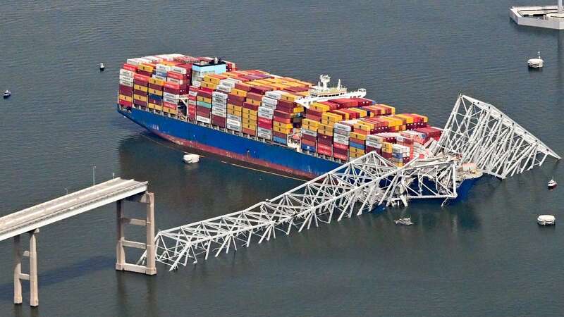 A huge cargo ship crashed into Francis Scott Key Bridge in Baltimore on Tuesday (Image: David Tulis/UPI/REX/Shutterstock)