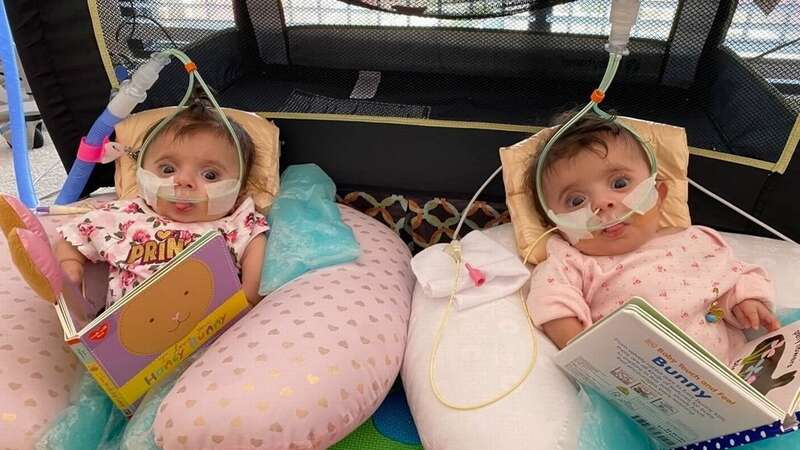 From left: Mia and Maryam, twin girls whose bones are as fragile as eggshell and the slightest knock can cause them to break (Image: Rayan Serhal / SWNS)