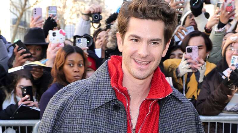 Andrew Garfield holds hands with 