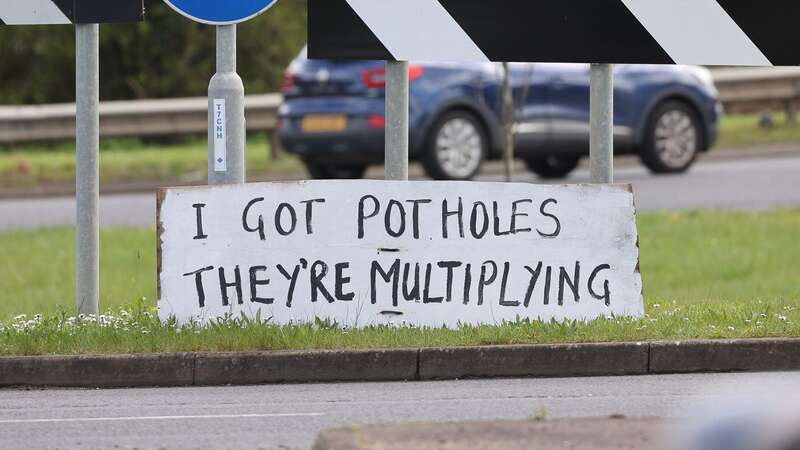 Protest sign at a roundabout on Eastern Way in Daventry (Image: SWNS)