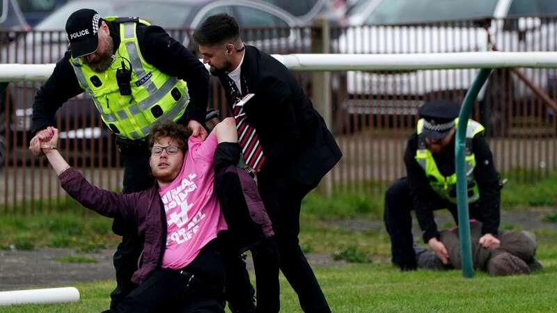 Animal rights activists burst on to the track last year before the start of the world ’s greatest steeplechase (Image: PA)