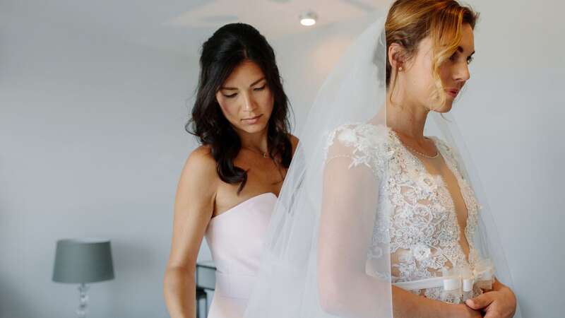 The maid-of-honour was furious when the bride found her dress (stock) (Image: Getty Images/iStockphoto)