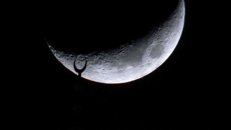 As tonight is the 29th day of Ramadan, Muslims everywhere will be watching the western horizon in the hopes of spotting a crescent moon (stock image) (Image: Anadolu via Getty Images)