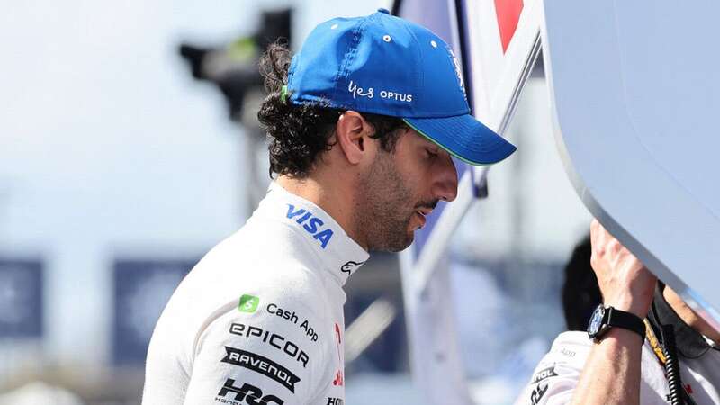 Daniel Ricciardo watches the Japanese Grand Prix from the pit wall after crashing on the first lap (Image: POOL/AFP via Getty Images)