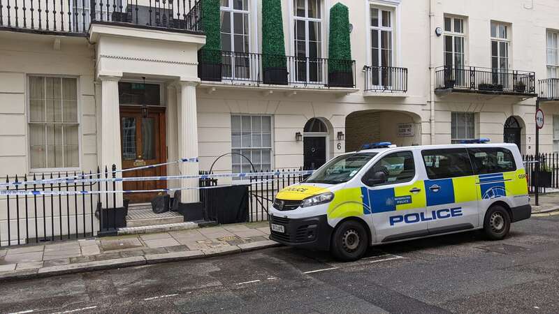 Police on the scene at Stanhope Place, Westminster (Image: SWNS)