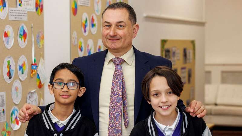 Student Hriday Doshi, headteacher Martin Blaine and student Finley Doran from Galleywall School (Image: SWNS)