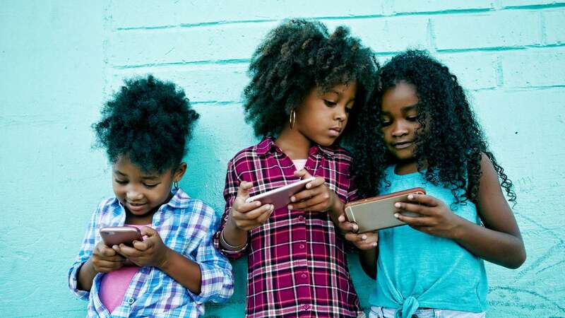 There has been plenty of debate over whether children should have smartphones (Image: Getty Images/Tetra images RF)